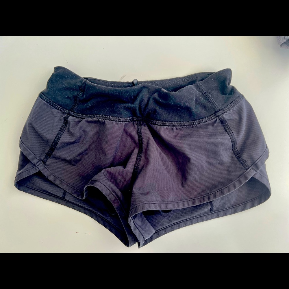 Girls black Ivivva Running shorts. Size 6.
